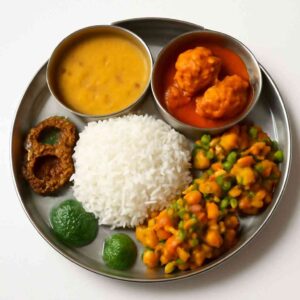 Chicken Thali (Rice + Dal + Vaja + Sabji + Chicken curry (2 pcs) + Chutney)