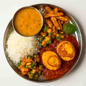 Egg Thali (Rice + Dal + Vaja + Sabji + Egg curry (2 pcs) + Chutney)